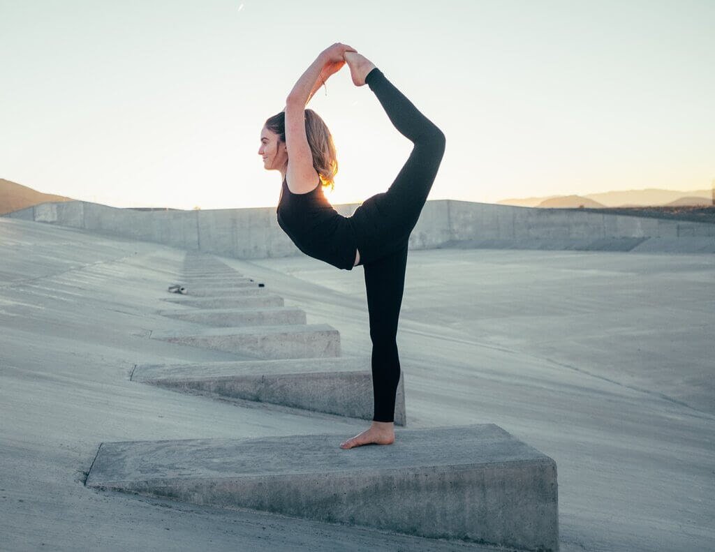 Image of woman practicing a yoga pose