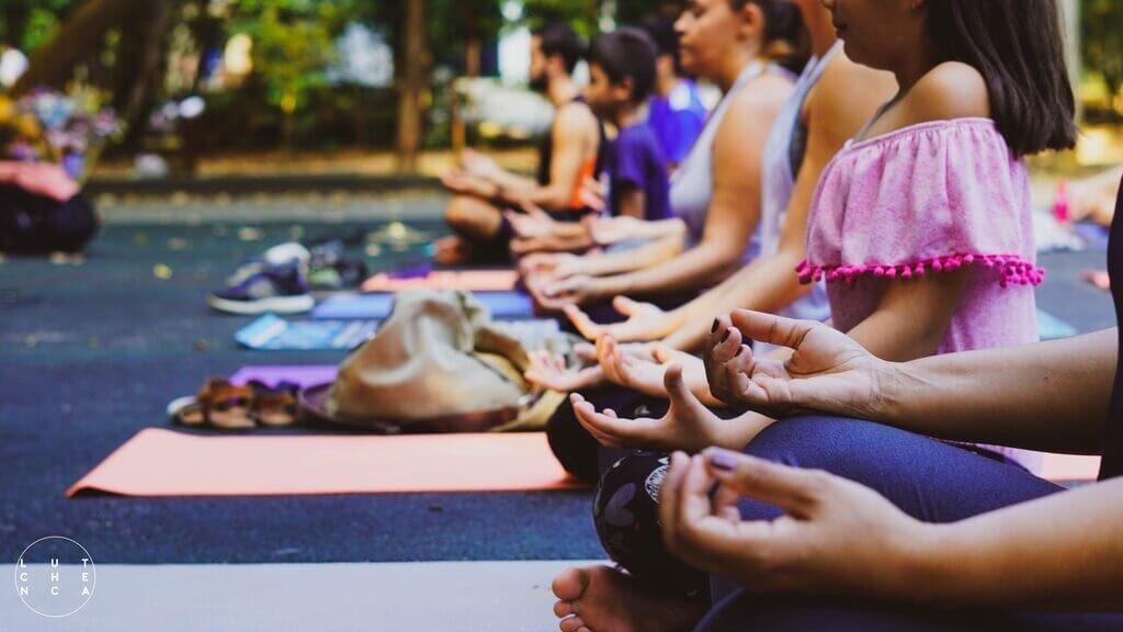 Image of people practicing yoga and meditation